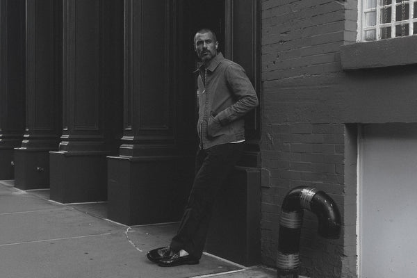 fit model posing in The Straight Foundation Pant in Organic Faded Black