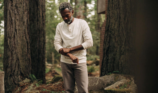 fit model showing off The Organic Cotton Henley in Vintage White