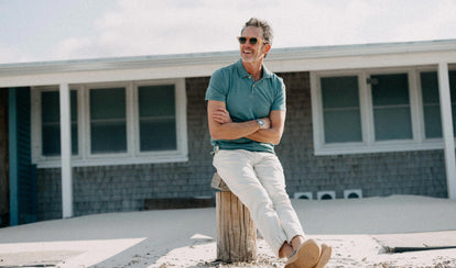 fit model posing in The Organic Cotton Polo in Washed Indigo