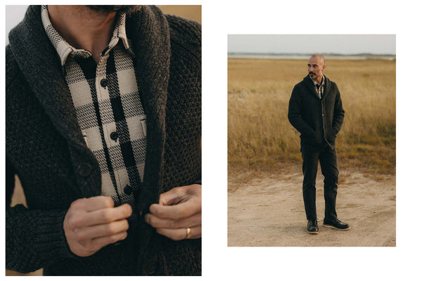 fit model posing in The Fisherman Shawl Cardigan in Heather Coal Merino