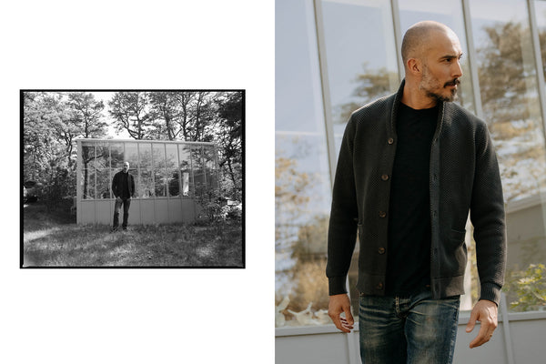 fit model walking wearing The Crawford Sweater in Charcoal