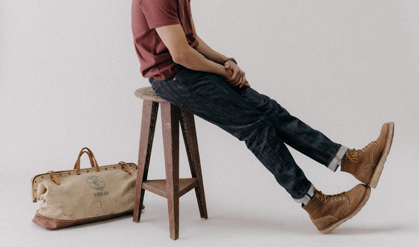 fit model walking wearing The Slim Jean in Rigid Organic Selvedge