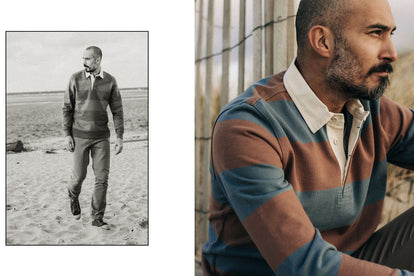 Model wearing The Rugby Shirt with pants while walking on the beach