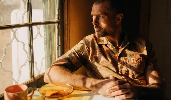fit model posing in The Hawthorne Shirt in Tea Desert Palm