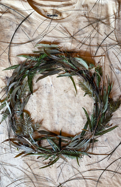 Anna Meier's process: a wreath laid atop a tee.