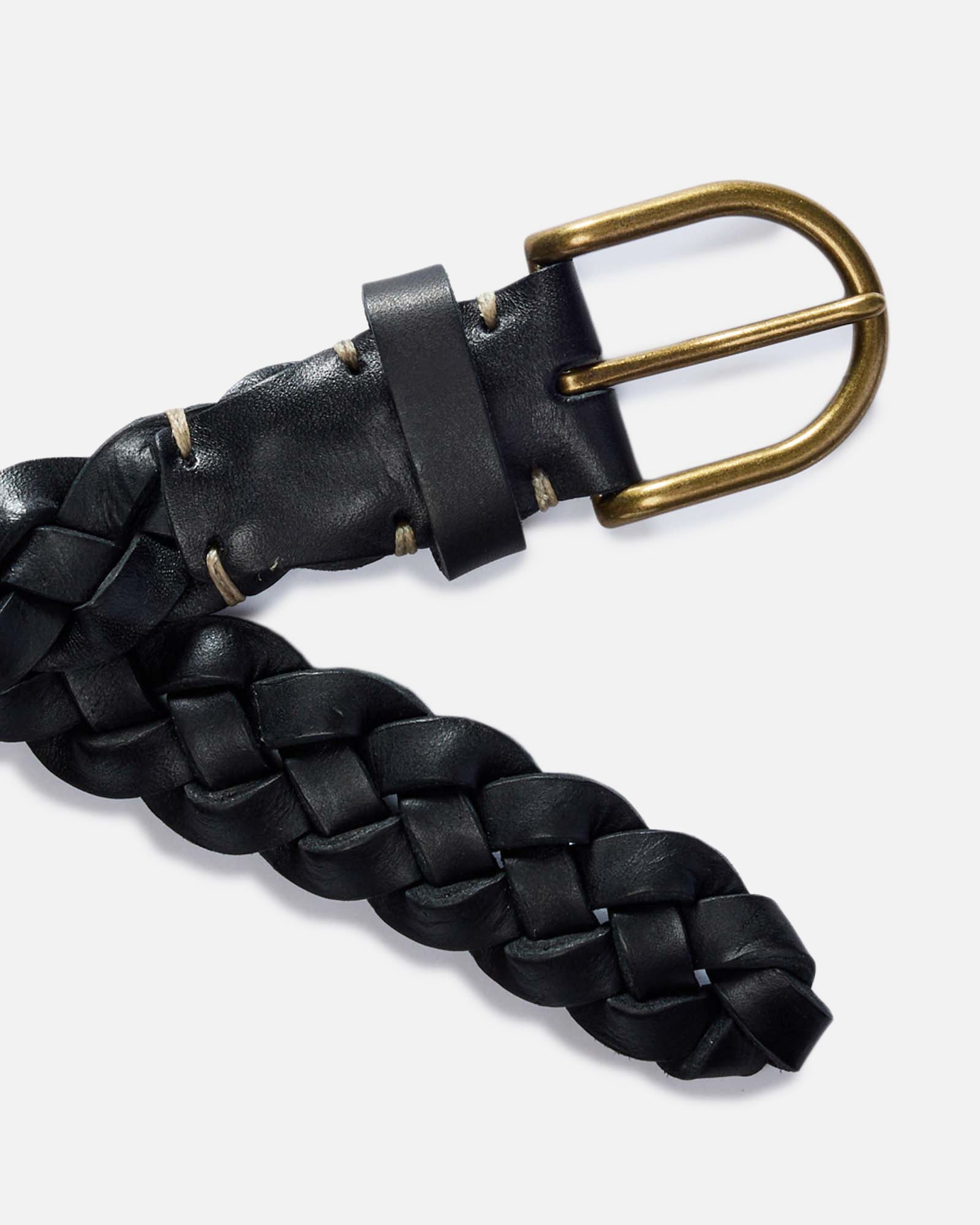 editorial image of the buckle and end of The Braided Belt in Black, Accessories by Taylor Stitch