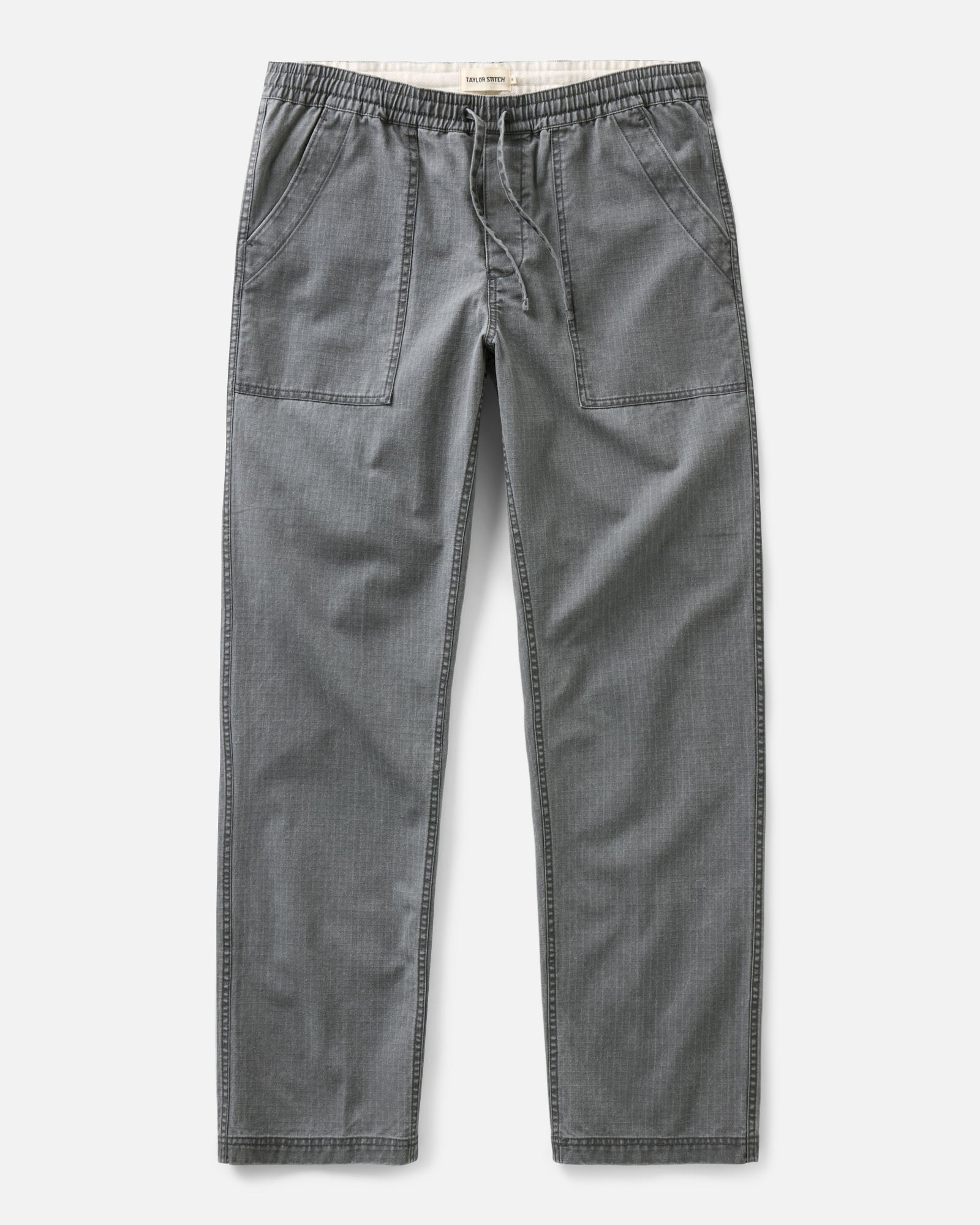 flatlay of The Breakwater Pant in Dark Grey Ripstop, Bottoms by Taylor Stitch