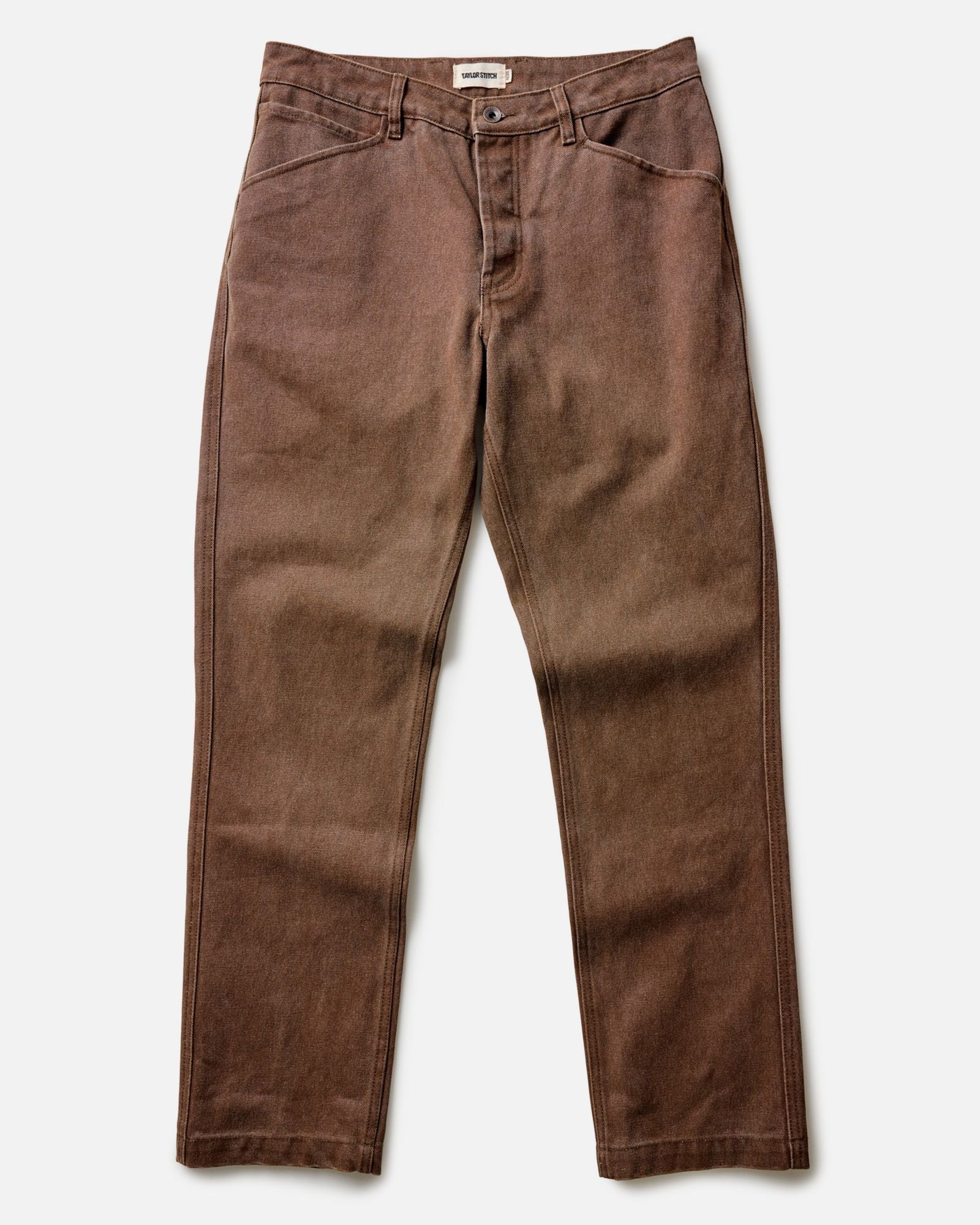 fit model adjusting cuffs on The Camp Pant in Aged Penny Chipped Canvas, Bottoms by Taylor Stitch