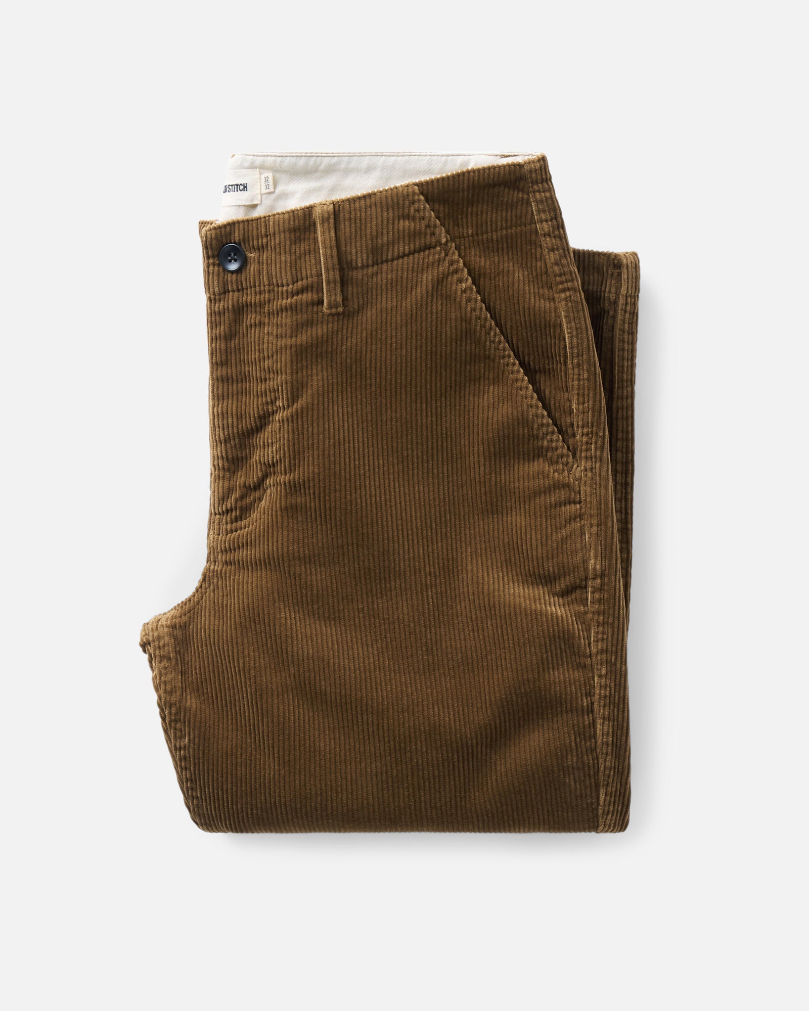 folded flatlay of The Carnegie Pant in Bourbon Corduroy, Bottoms by Taylor Stitch