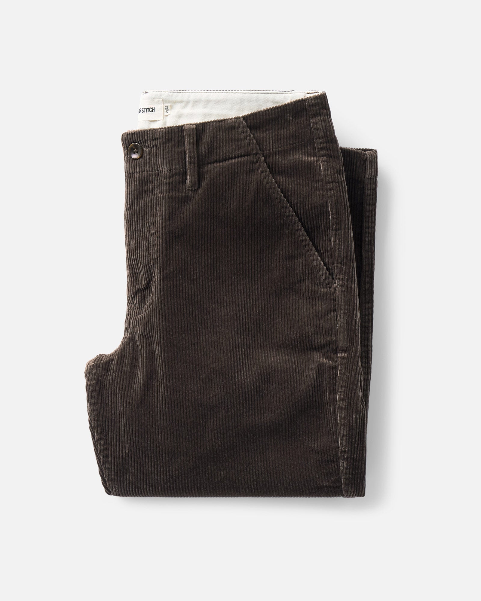 folded flatlay of The Carnegie Pant in Soil Corduroy, Bottoms by Taylor Stitch