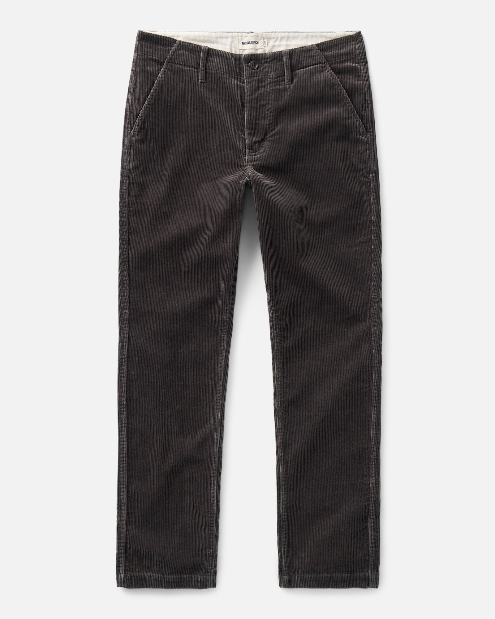 flatlay of The Carnegie Pant in Soil Corduroy, Bottoms by Taylor Stitch