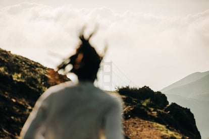 Blurred shot of a runner heading towards The Golden gate Bridge.