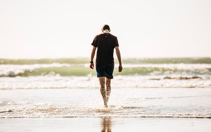 Our guy walking into the ocean.