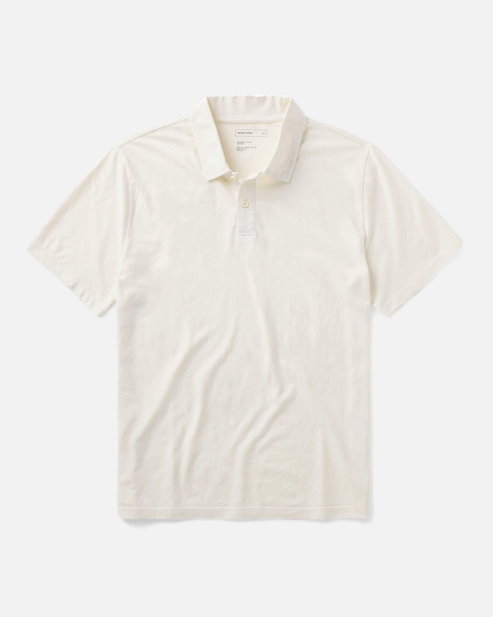flatlay of The Cotton Hemp Polo in Vintage White, Knits by Taylor Stitch