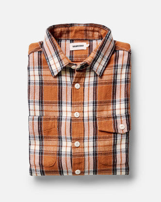 folded flatlay of The Crater Shirt in Brick Plaid