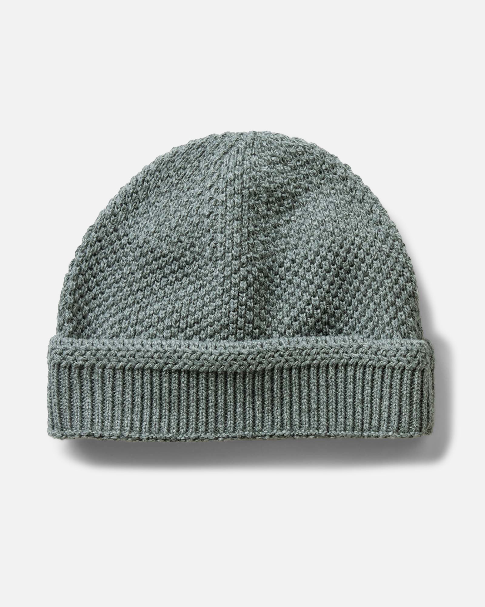 flatlay of The Crawford Beanie in Deep Sea Twist, Accessories by Taylor Stitch