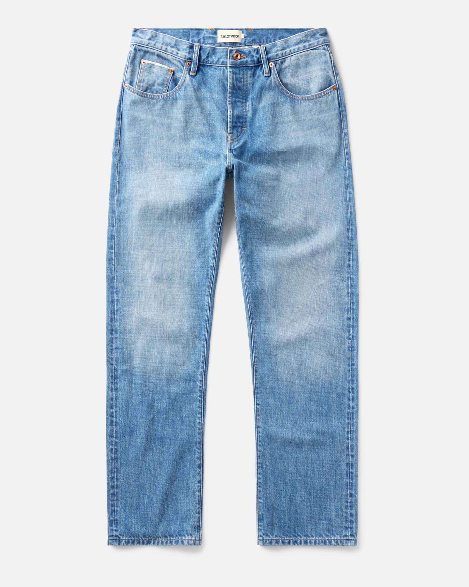 flatlay of The Democratic Jean in Light Wash Organic Selvedge, Bottoms by Taylor Stitch