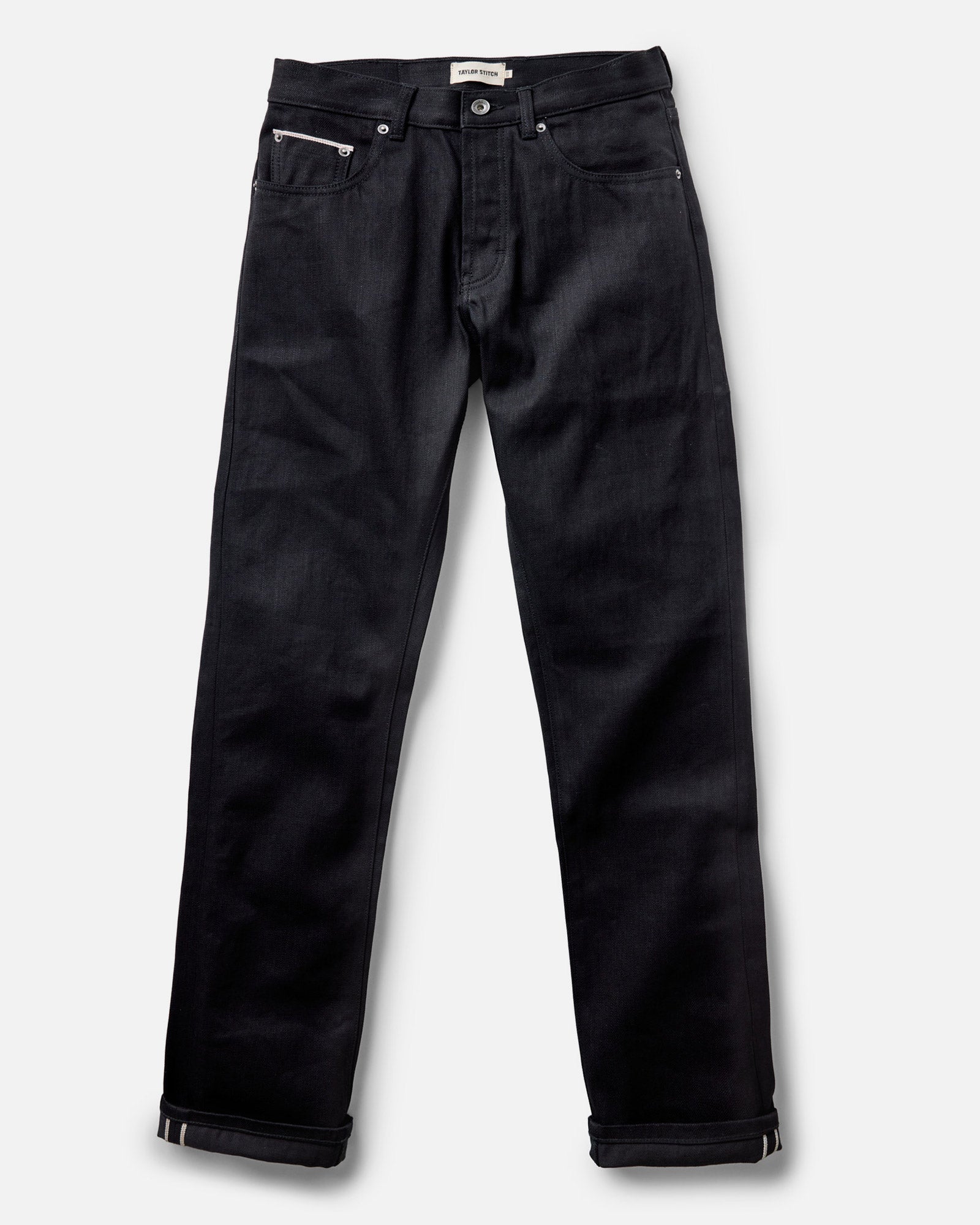 flatlay of The Democratic Jean in Rigid Black Organic Selvedge, Bottoms by Taylor Stitch