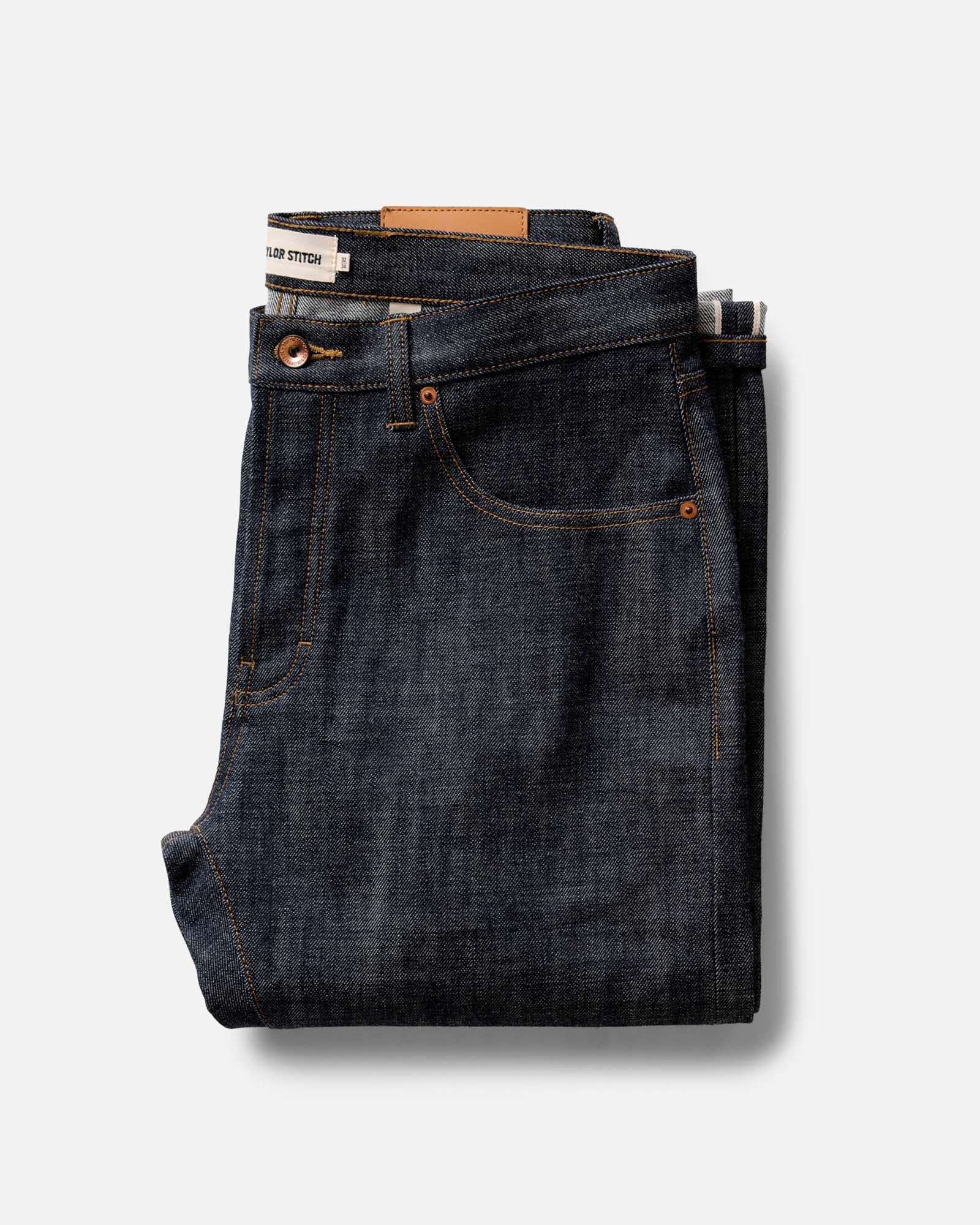 folded flatlay of The Democratic Jean in Rigid Organic Selvedge, Bottoms by Taylor Stitch