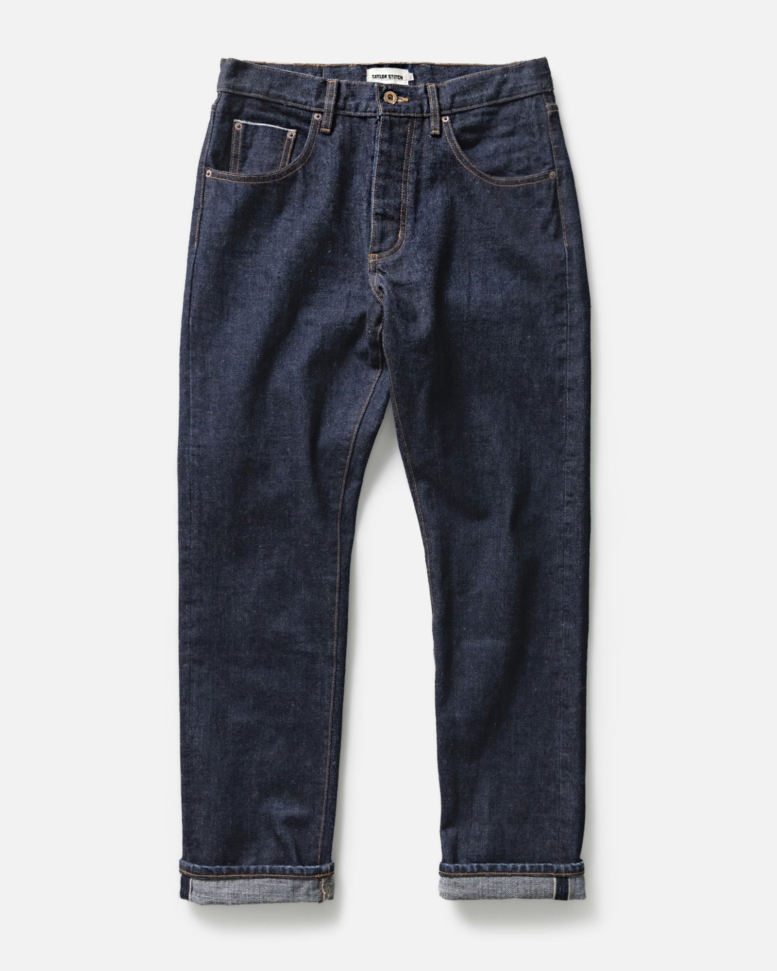 flatlay of The Democratic Jean in Rinsed Yoshiwa Selvedge, Bottoms by Taylor Stitch