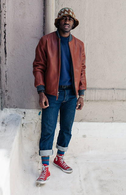 Modelling The Presidio Jacket, styled with red high-top Converse and rolled up jeans.