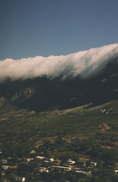 Clouds spilling over the top and down the cliffs of Cape Town.