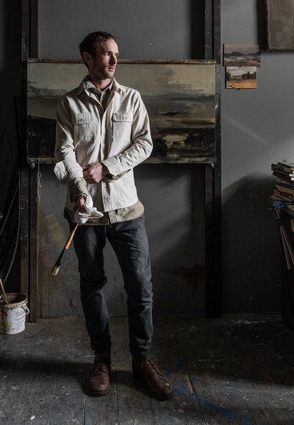Tim painting in his studio in the Chore Shirt