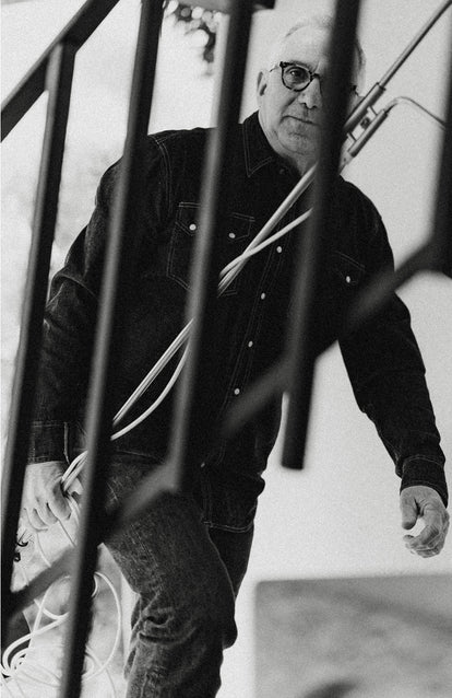 Jeff Farnsworth walking up the stairs