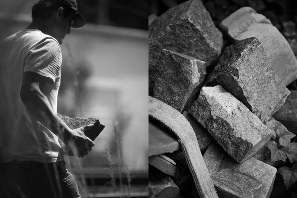 Matt Byrd walking with bike on a railroad track