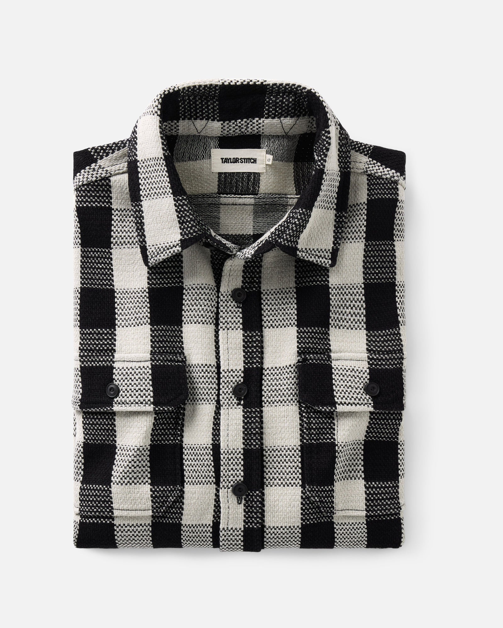 folded flatlay of The Division Shirt in Black Indigo Check, Wovens by Taylor Stitch