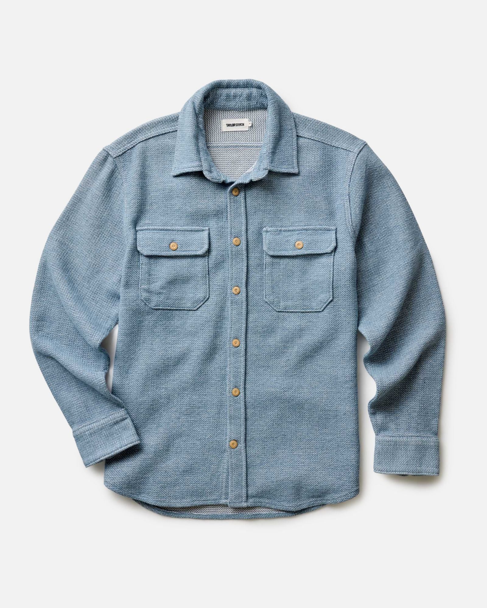 fit model walking in The Division Shirt in Washed Indigo, Wovens by Taylor Stitch