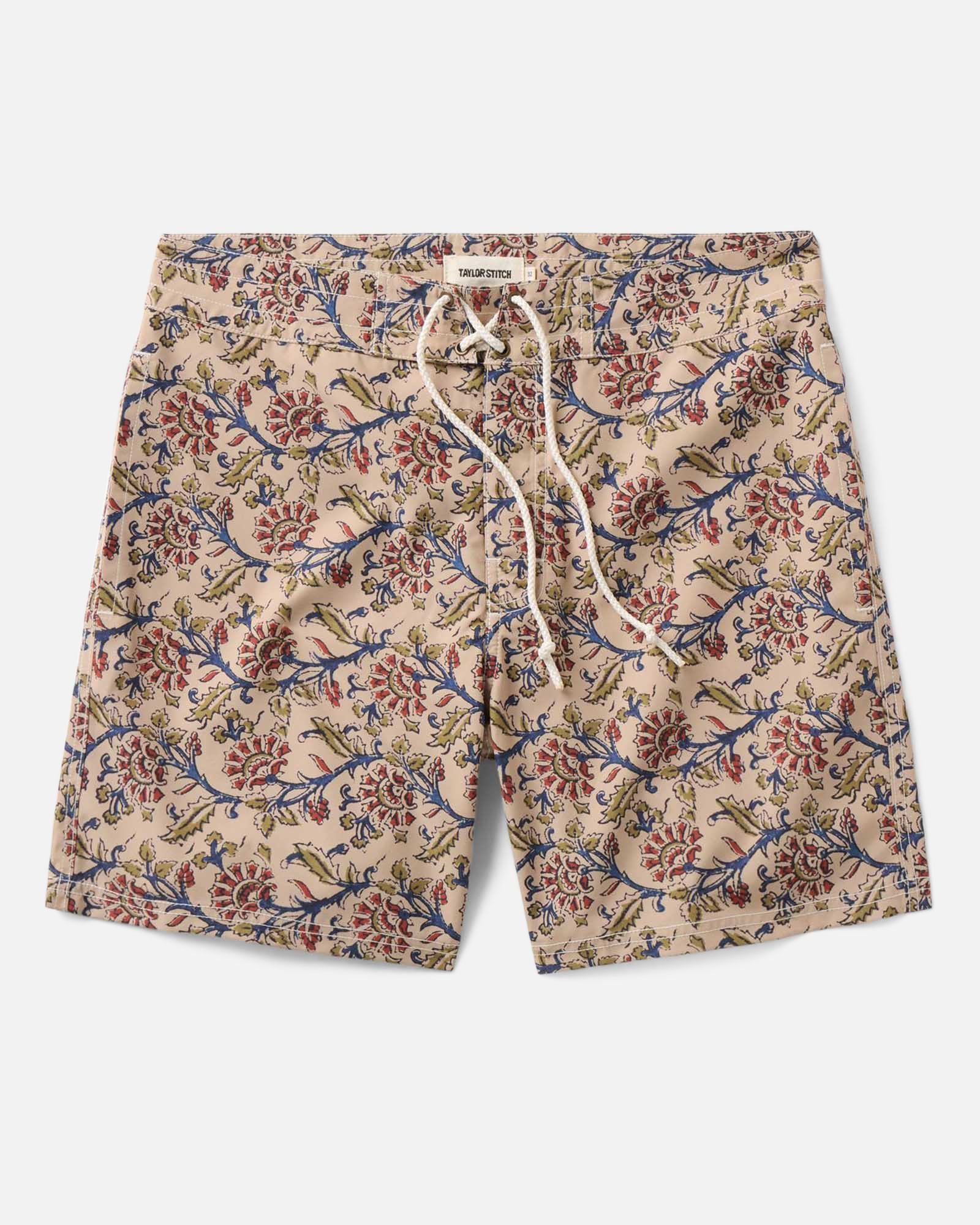 flatlay of The Drift Boardshort in Ivory Floral, Bottoms by Taylor Stitch
