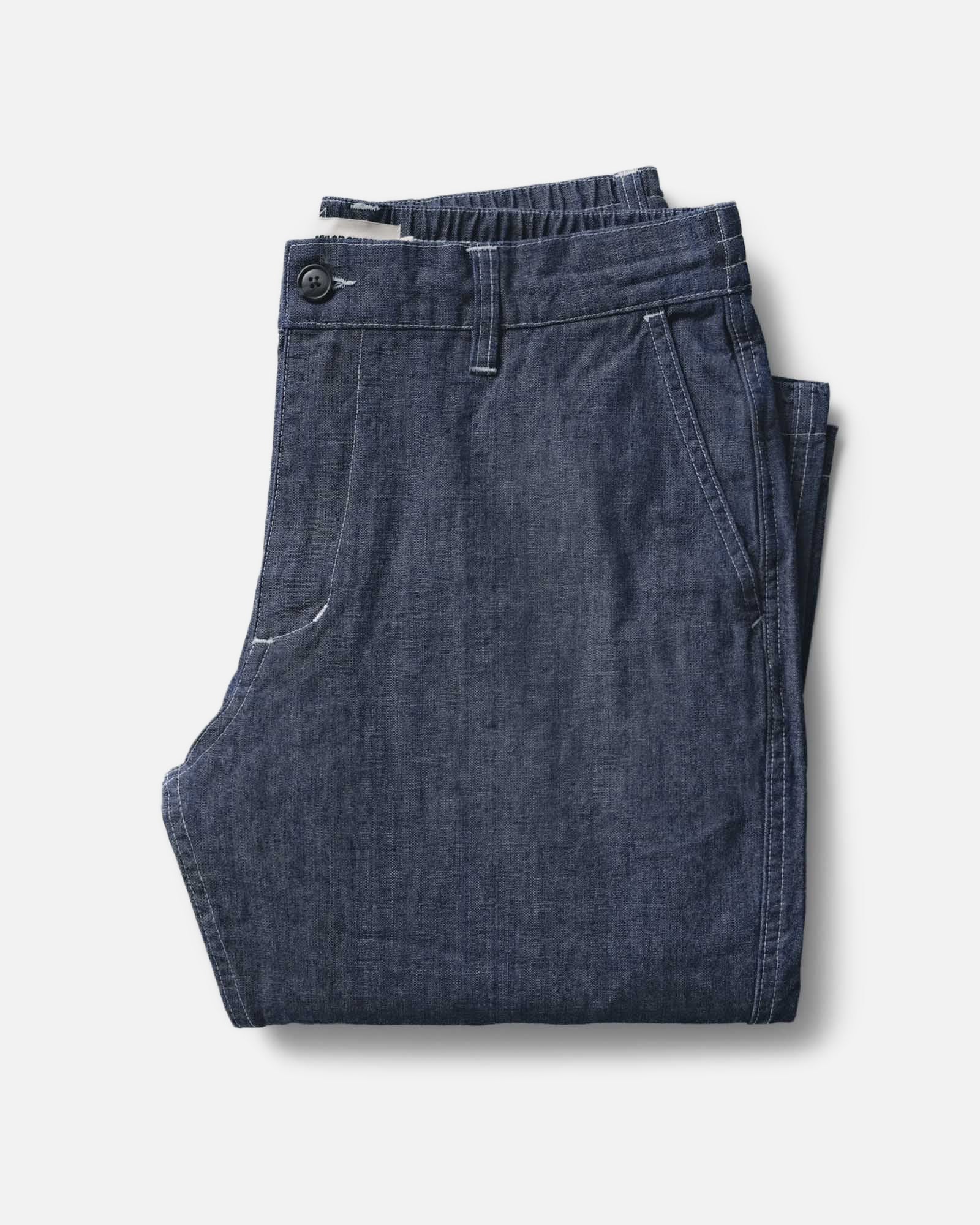 folded flatlay of The Easy Pant in Washed Indigo Chambray, Bottoms by Taylor Stitch