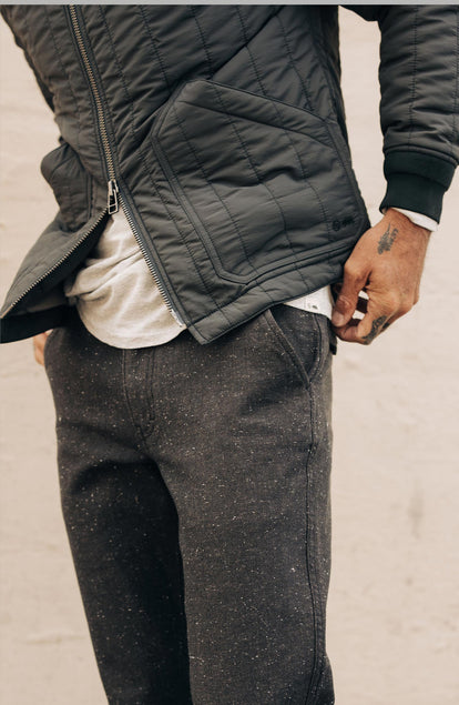 fit model in The Able Jacket in Faded Black Quilted Nylon