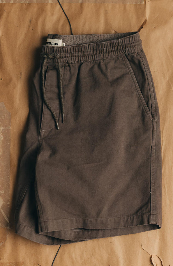 editorial flatlay of The Apres Short in Organic Espresso Foundation Twill