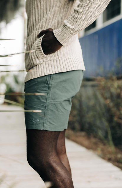 fit model wearing the apres short in sea green