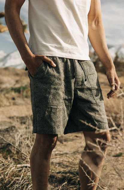 Our model standing in The Apres Trail Short in Static Camo Double Cloth