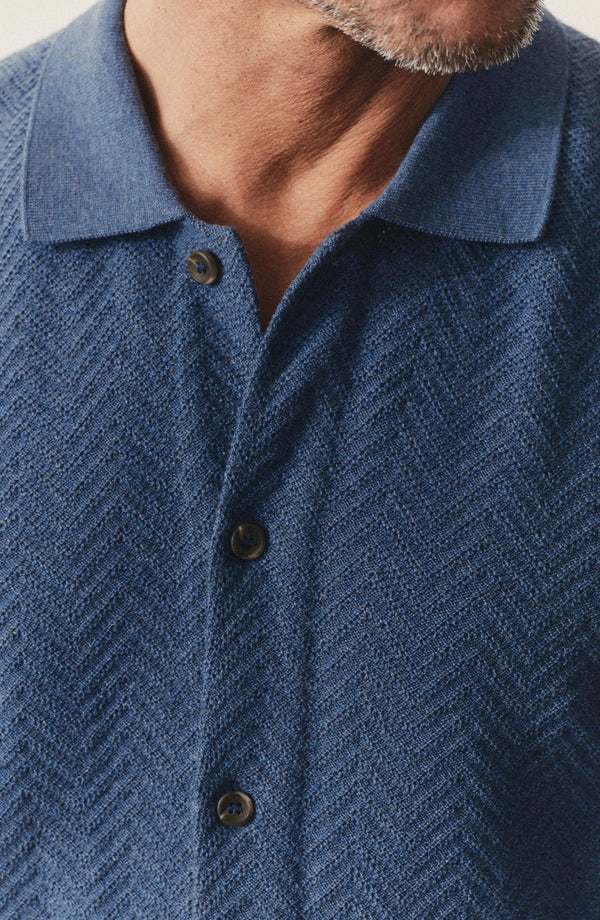 fit model showing off the collar on The Button Down Polo in Gulf Stream Herringbone