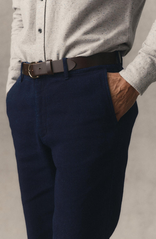 fit model with his hands in the pockets of The Camden Pant in Rinsed Indigo Sashiko