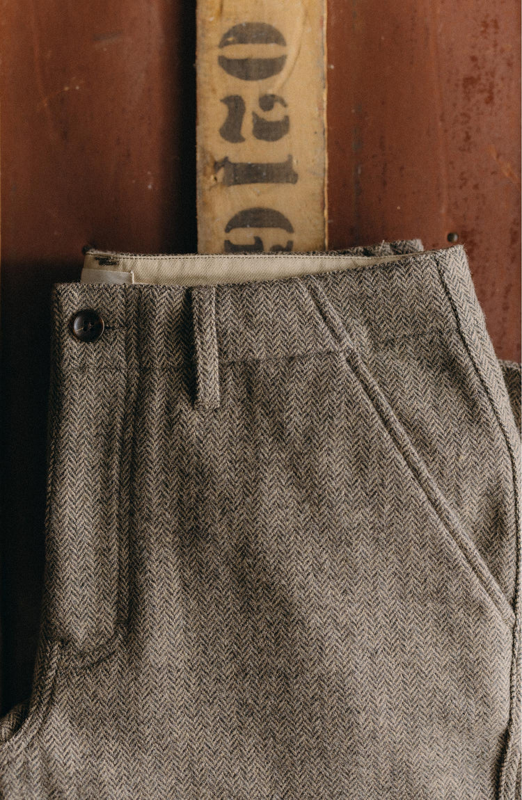 editorial image of the waistband on The Carnegie Pant in Gravel Herringbone Wool
