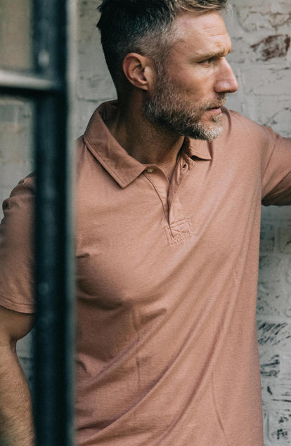Our model standing in The Cotton Hemp Polo in Dried Acorn