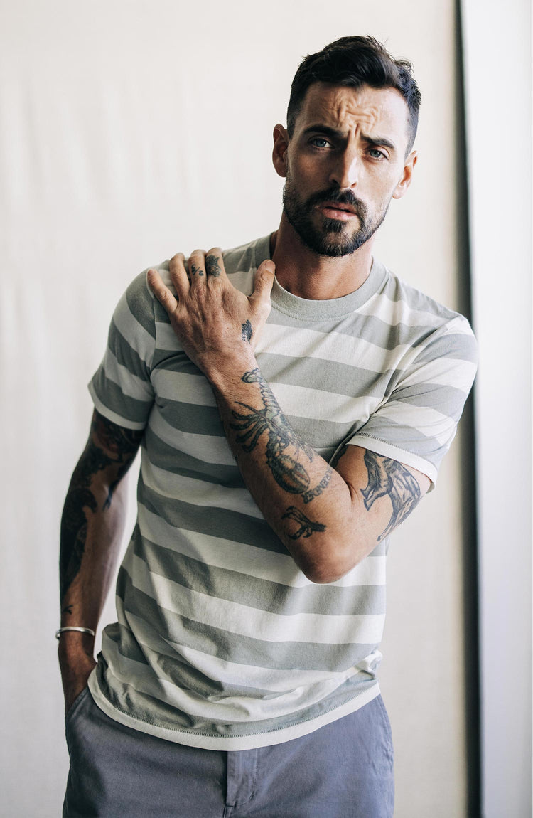 Our model wearing the cotton hemp tee in natural and sagebrush stripe