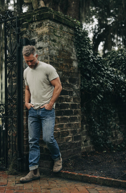 Our model standing in the cotton hemp tee in sagebrush