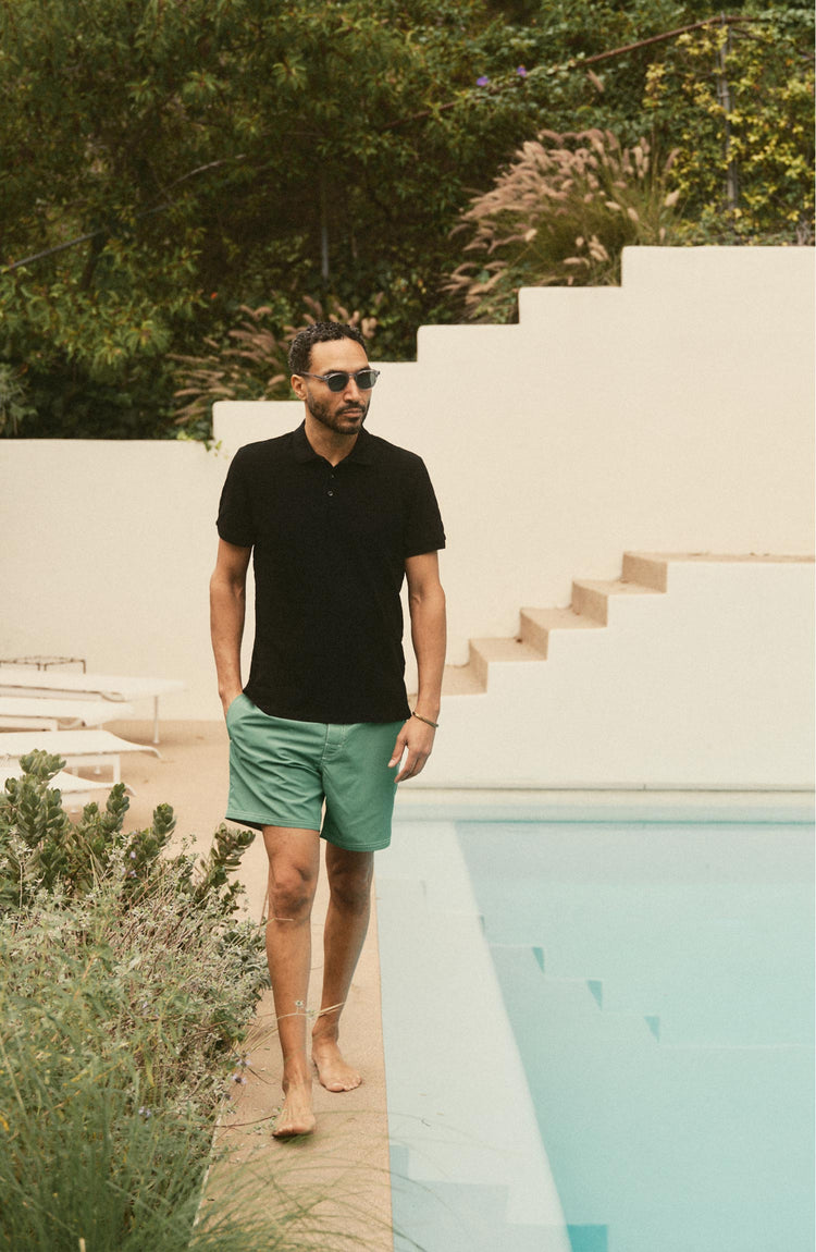 fit model posing in The Drift Boardshort in Ivy