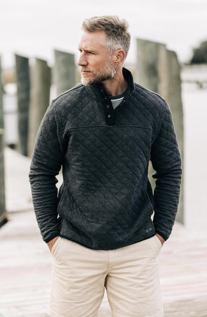 Model in the fall line pullover in coal