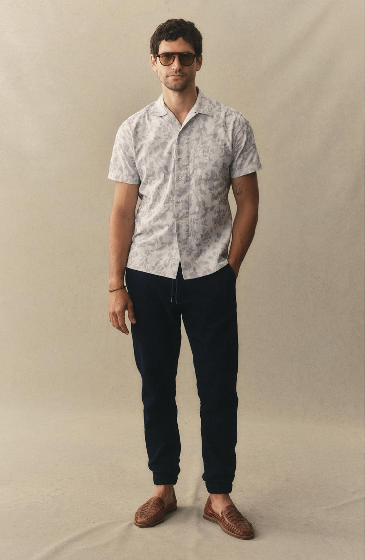 fit model posing in The Hawthorne Shirt in Sky Blue Floral Jacquard