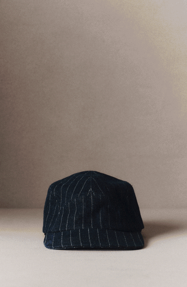 An assortment of Hypeadelic x TS caps