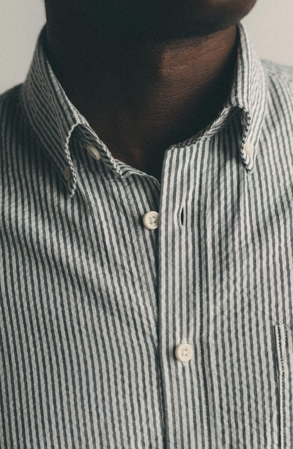 fit model showing off the collar on The Jack in Navy Stripe Seersucker