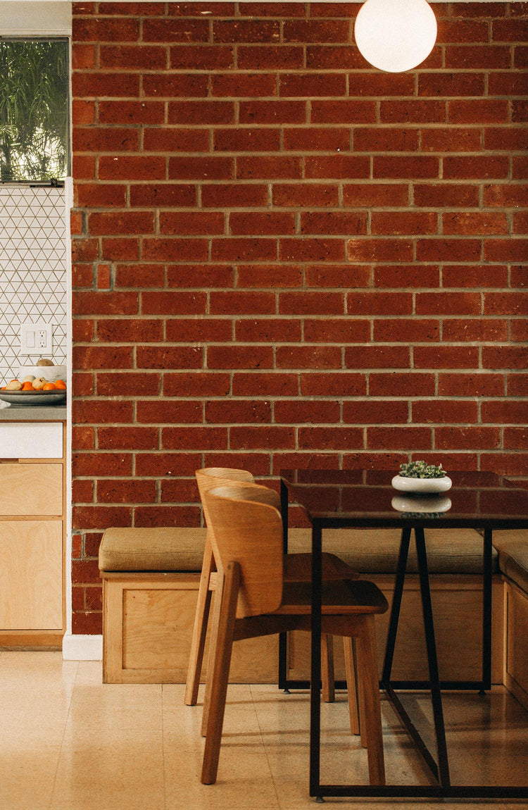 interior of kitchen with a brick wall