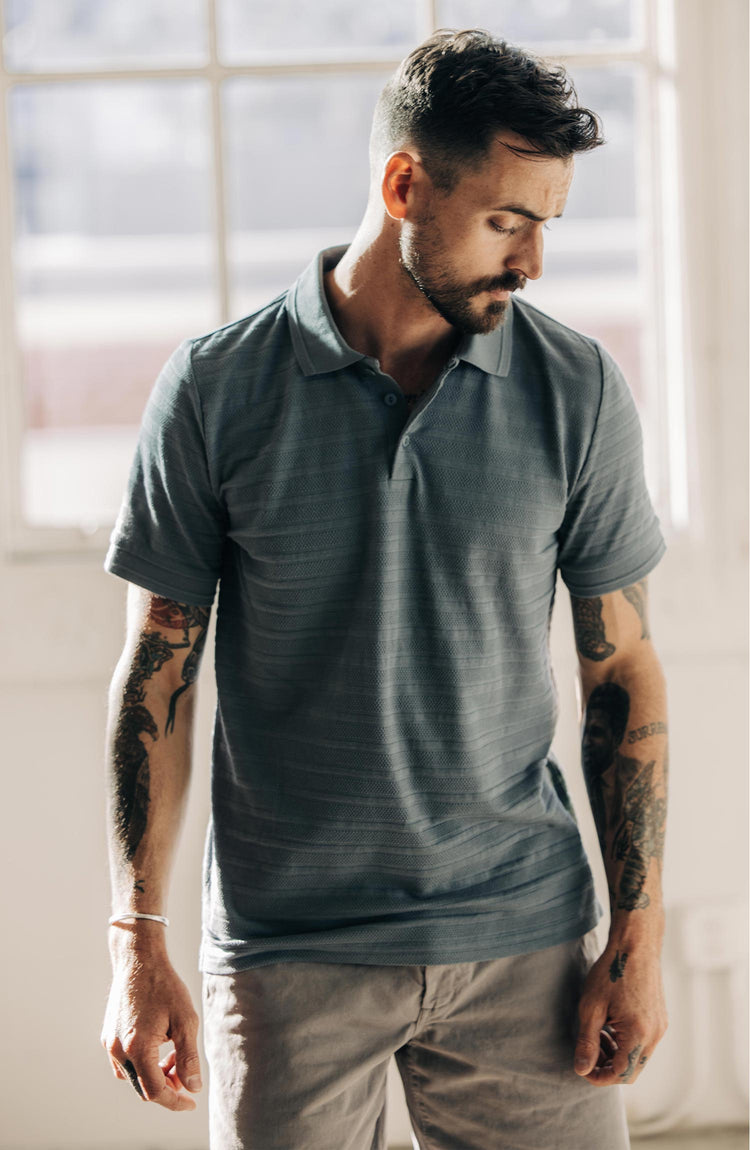 Our model wearing The Jacquard Polo in Storm